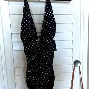 Ralph Lauren one piece swimsuit. New with tags. Black/white polka dots. Size 12